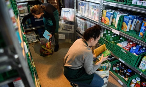 Volunteers at a foodbank in Wandsworth prepare food parcels