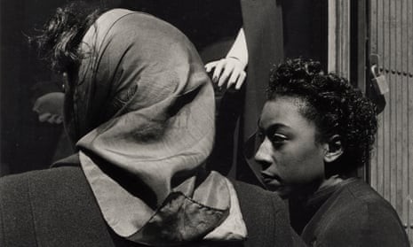 Two women, mannequin’s hand, 1952, Roy DeCarava.