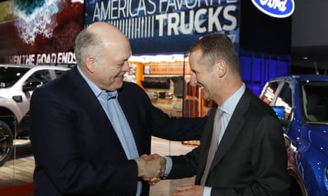 Ford’s CEO, Jim Hackett, left, meets Herbert Diess, CEO of Volkswagen, on Monday in Detroit.