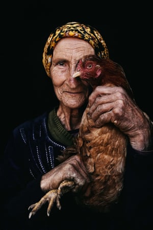 Fascinating faces and characters – second place | This Is My Eye by Ahmed El Hanjoul. A 70-year-old woman with wrinkled face and hands, worn from a life of work, with a hopeful smile. She carries her hen in such a way that it becomes a piece of her