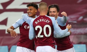Aston Villa’s English striker Ollie Watkins (L) celebrates after scoring.