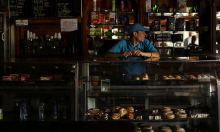 A worker inside a bakery.