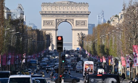 Traffic on the Avenue des Champs-Élysées in Paris, France, December 2023