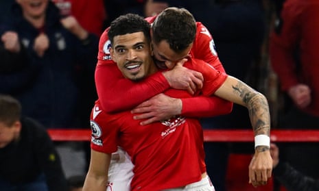 Morgan Gibbs-White of Nottingham Forest celebrates with teammate after putting their team 3-0 up against Brighton from the penalty spot.
