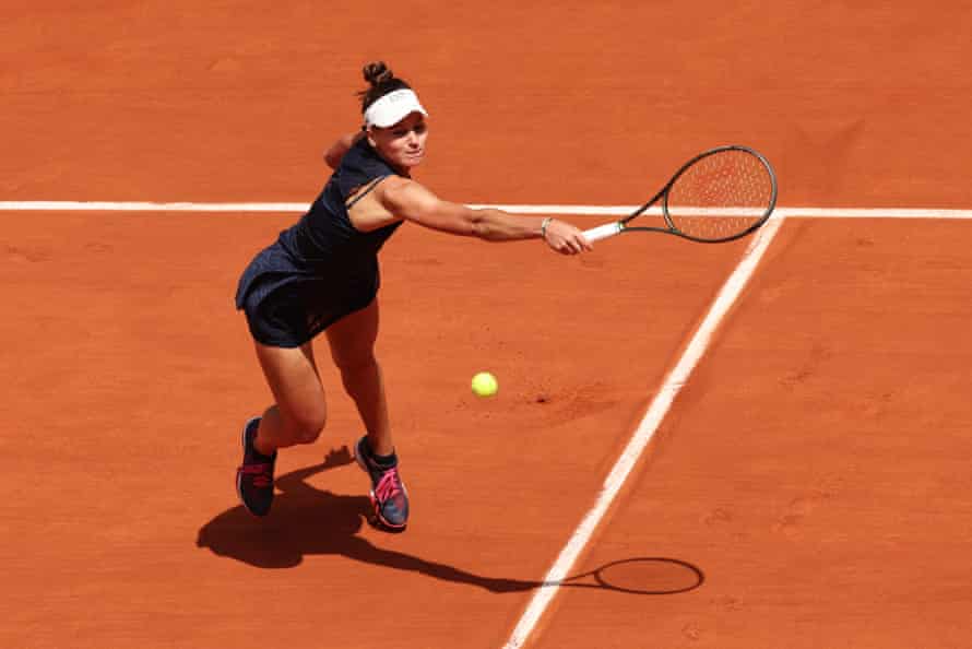 Veronika Kudermetova stretches to play a backhand.