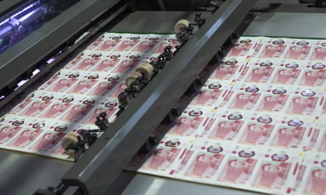 New £50 notes featuring scientist Alan Turing on the printing press. 