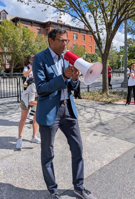 a man speaks into a megaphone