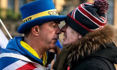 Main in 'stop Brexit' nose-to-nose with man in Union Jack bobble hat.