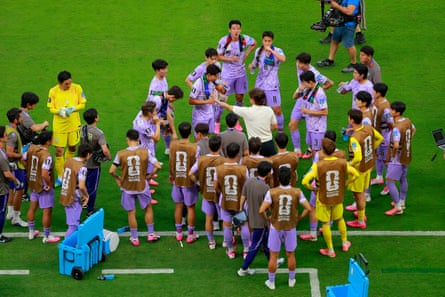 South Korea coach Hong Myung-bo gives retired instructions during a hydration break astatine Guadalajara Stadium