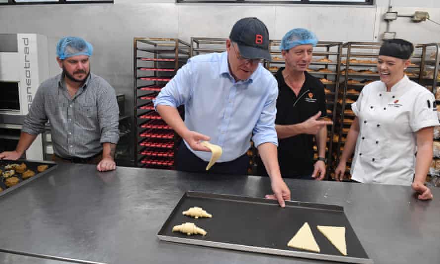 Scott Morrison makes croissants during a visit to a bakery in Townsville on Tuesday.