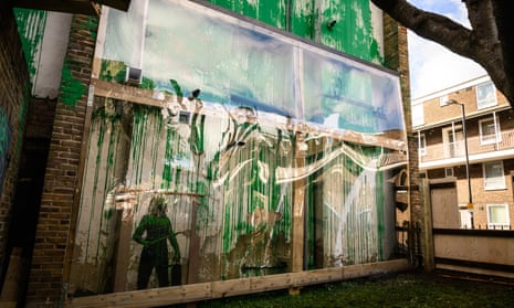 presentation of london city The Banksy mural after it was covered with clear plastic