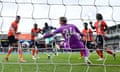  Luton Town goalkeeper Thomas Kaminski is beaten by the second goal scored by Yoane Wissa of Brentford.