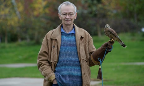 David Bradley, who played Billy Casper in the 1969 film Kes, with a kestrel in a park in Barnsley, South Yorkshire.
