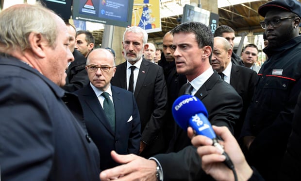 A man looking for his daughter, who went missing in the Paris attacks, speaks to Manuel Valls