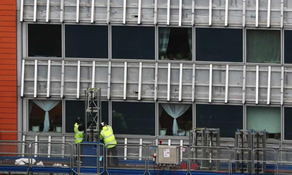 Contractors undertake work at a property in Paddington, London, as part of a project to remove and replace non-compliant cladding. 