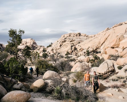 Hikers walk along a trail. The government shutdown is over, for now.