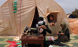 displaced Syrian woman, Syria’s northwestern Idlib province