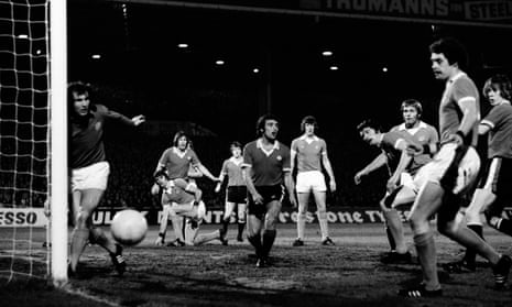 United’s Lou Macari reacts and City goalkeeper Joe Corrigan watches as the ball goes the wrong side of the pos during the fourth round of the League Cup in November 1975. City won the game 4-0.
