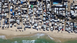 An aerial view of al-Mawasi area in Gaza filled with makeshift tents by the sea