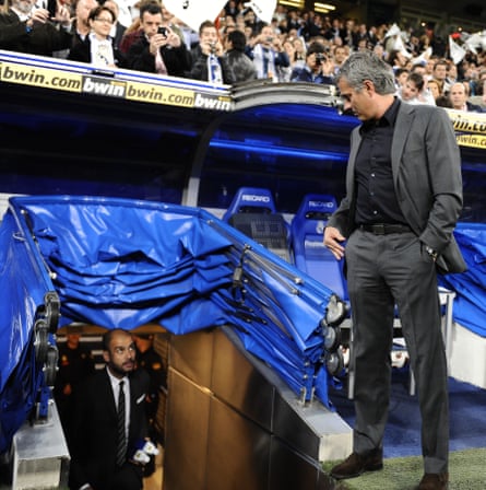 José Mourinho waits for Pep Guardiola outside the tunnel