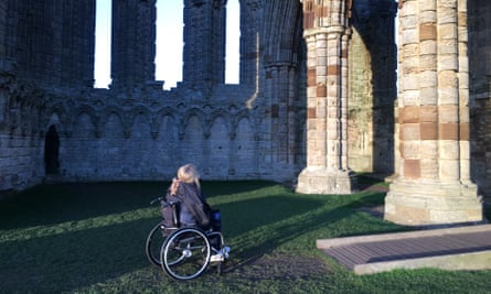 Wheelchair user in abbey ruins