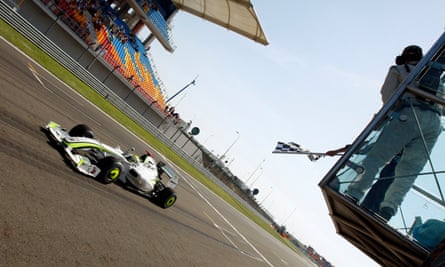 Jenson Button crosses the finish line in Istanbul in 2009