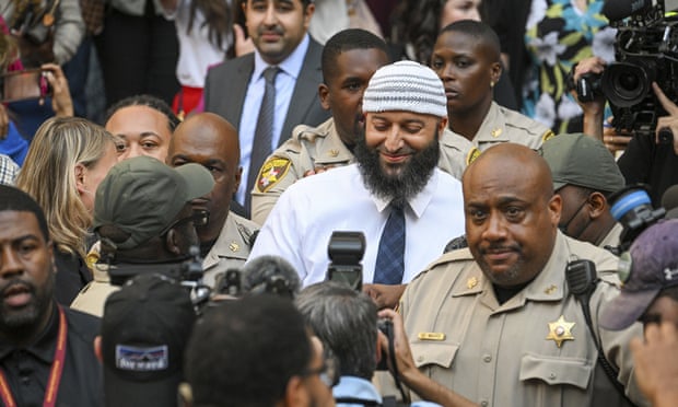 Adnan Syed departs after a judge overturned his 2000 murder conviction and ordered a new trial during a hearing in Baltimore, Maryland.