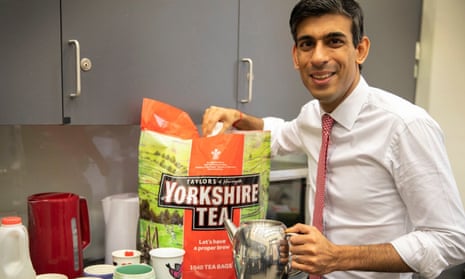 Rishi Sunak with a teapot and a huge packet of teabags