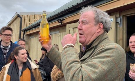 Jeremy Clarkson during a raffle outside The Squat Shop, on his farm, Diddly Squat.