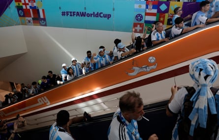 Argentina fans arrive at the Lusail metro stop before their opening group game against Saudi Arabia at the Lusail Iconic Stadium,