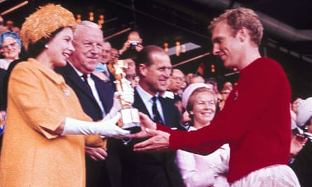 Queen Elizabeth II presenting the Jules Rimet trophy to England’s team captain Bobby Moore in 1966.