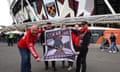 Bayer Leverkusen fans display a banner outside the stadium before the match.