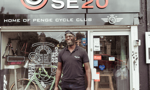 Winston Farquharson outside his bike shop, SE20.