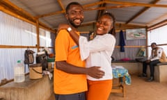 Frida Mtapie, a psychologist at Le Village de L’amour in Yaoundé, Cameroon, dancing with patient Tchinda Ernest. All photographs: Media Lens King/The Guardian