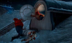 Paddington Bear knocks over the burglar in the M&S Christmas ad