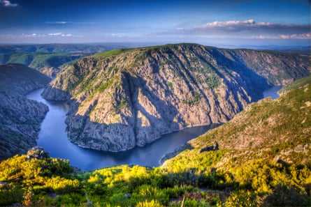 River bend in hills in evening light
