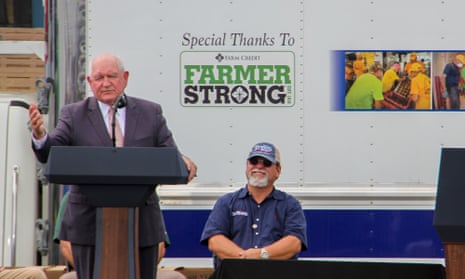 The agriculture secretary, Sonny Perdue, addresses an agriculture department event in Mills River, North Carolina, in August at which he led a chant of ‘four more years’ for Donald Trump, who was also present.