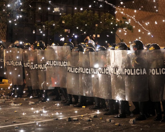Peru: police and anti-government protesters clash outside congress – video