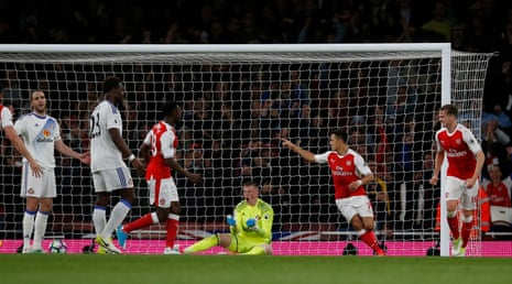 Arsenal’s Alexis Sanchez celebrates scoring their first goal.