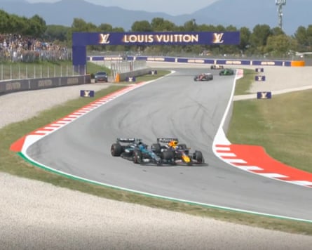 Max Verstappen collides with George Russell during the Spanish Grand Prix on Sunday.