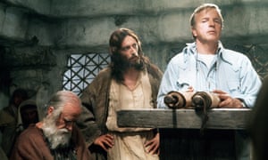 Robert Powell, centre, and Franco Zeffirelli during the filming of Jesus of Nazareth.