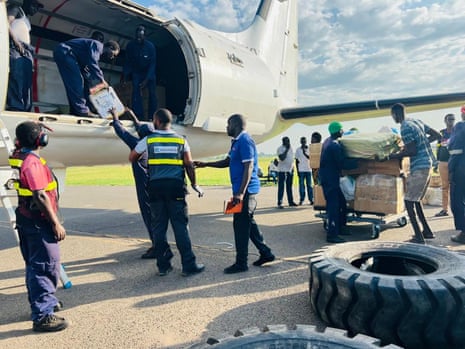 Ground crew unloading cargo from Kenyan startup Encomm Aviation's BAe ATP aircraft