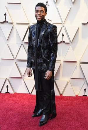 Chadwick Boseman was one of several men giving looks beyond the usual tuxedos. This customised Givenchy suit - a favourite of Boseman - is detailed with sequins and silks