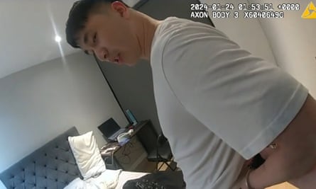 Undated screengrab of a Chinese man wearing a grey T-shirt in a bedroom.