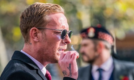 Reclaim party leader Laurence Fox, with a freedom tattoo on his hand, pays his respects on Remembrance Sunday.