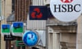 a high street with major bank branch logois, including Lloyds, Barclays, NatWest and HSBC