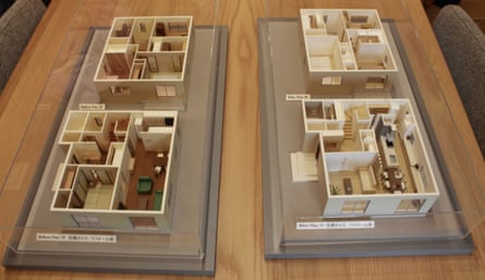 Models displaying the floorplans of a pre- and post-renovation home built by the housing manufacturer Sekisui House, at their showroom facilities north of Tokyo, Japan.