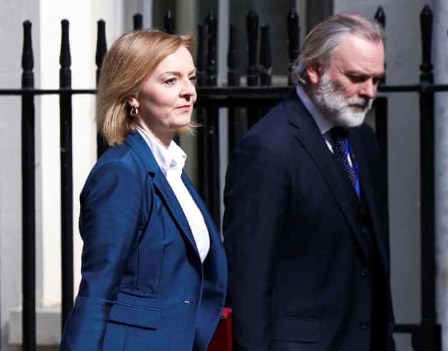 Liz Truss, the foreign secretary, and Tim Barrow, political director at the Foreign Office, arriving at 10 Downing Street this morning ahead of cabinet.