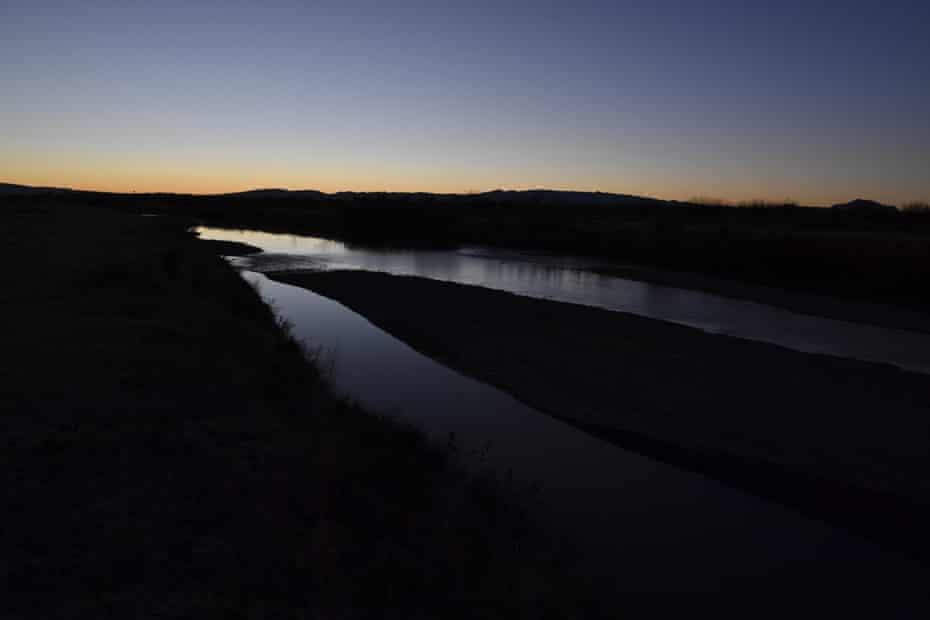 Rio Bravo, the natural border between Ojinaga, Mexico, left and Presidio, US, February 20