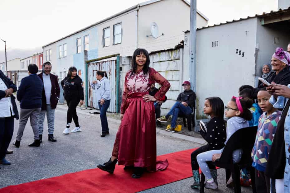 Cleo Paulse, 18, posing on a red carpet at her family home in Hanover Park. She is the eldest of three siblings and the second person in her family, after her mother, to finish high school.